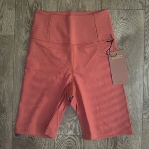 Girlfriend Collective- high rise rib biker short. Retail $90
